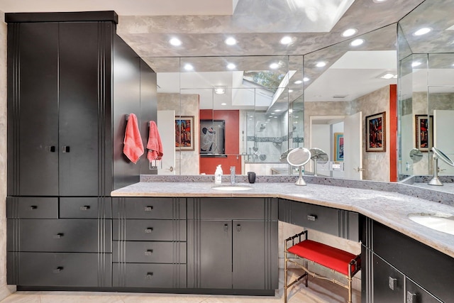 kitchen with sink and light stone countertops