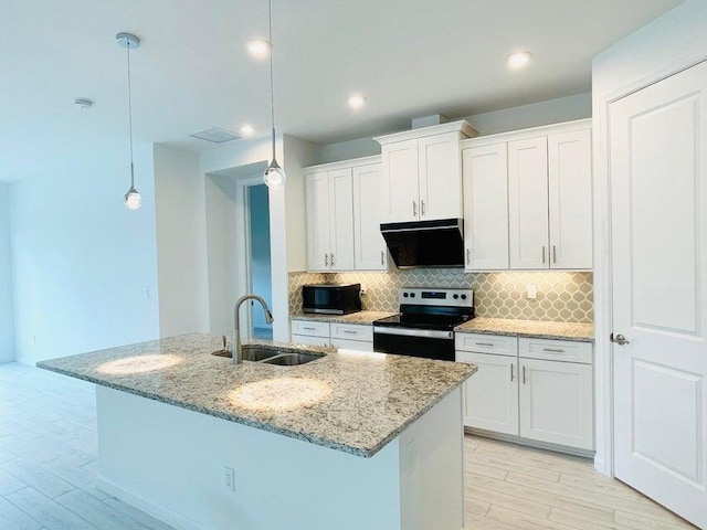 kitchen featuring pendant lighting, sink, white cabinetry, stainless steel electric stove, and exhaust hood