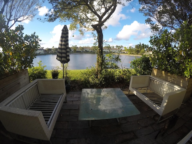 view of patio / terrace with a water view