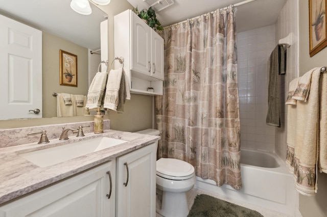 full bathroom featuring vanity, toilet, and shower / tub combo