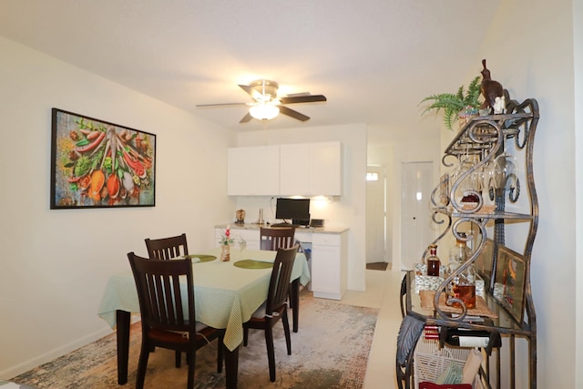 dining area featuring ceiling fan