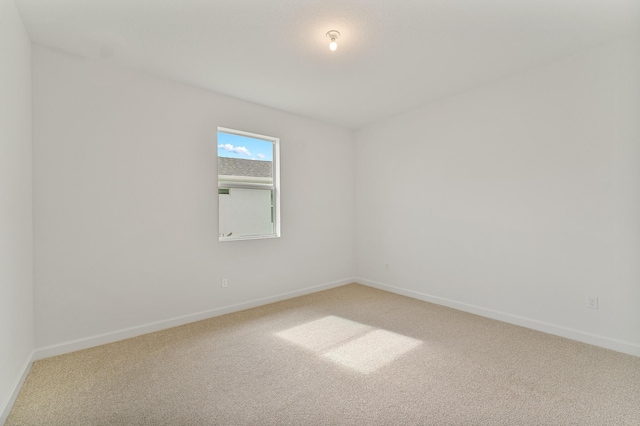 empty room with carpet floors