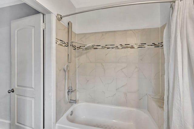 bathroom featuring shower / tub combo with curtain