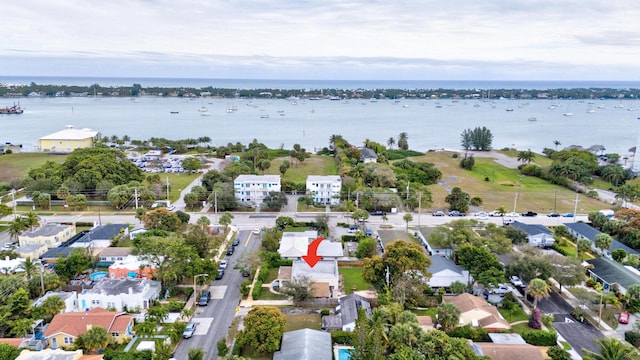 birds eye view of property featuring a water view