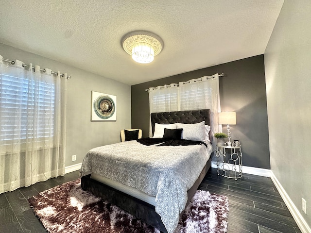 bedroom featuring a textured ceiling