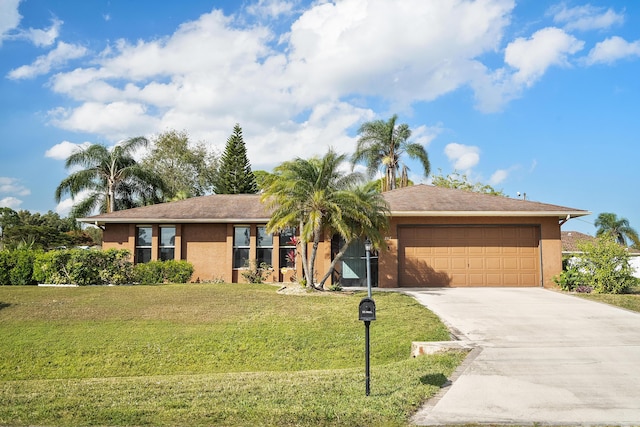 ranch-style house with an attached garage, concrete driveway, a front yard, and stucco siding