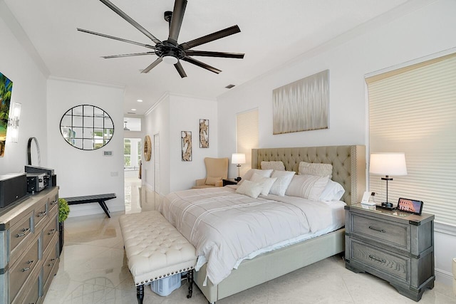 bedroom featuring ceiling fan and ornamental molding