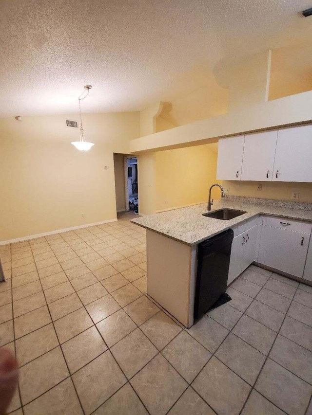 kitchen with light tile patterned flooring, sink, decorative light fixtures, black dishwasher, and white cabinets