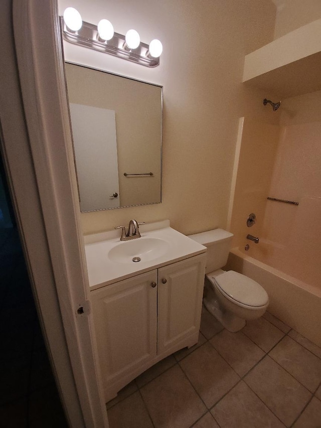 full bathroom with vanity,  shower combination, tile patterned floors, and toilet