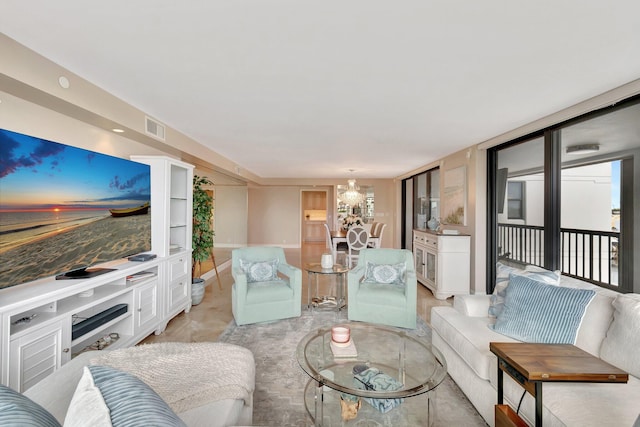 400 N Flagler Dr Unit 506, West Palm Beach, FL 33401 - living area featuring a chandelier