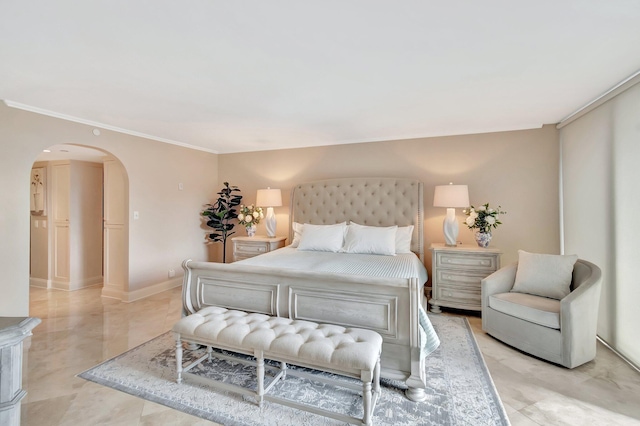 bedroom featuring arched walkways, crown molding, and baseboards