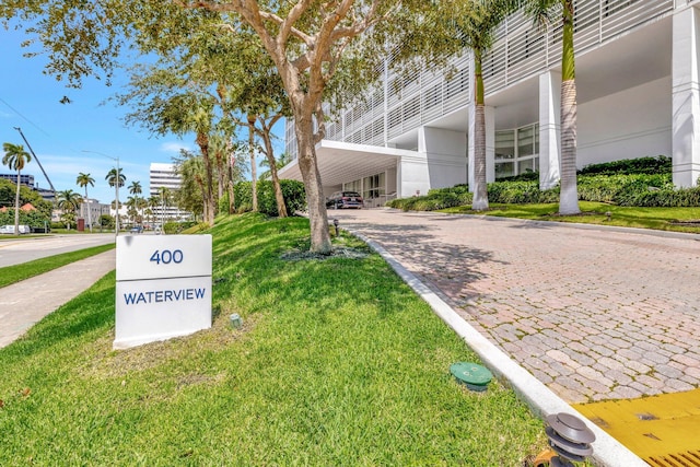 400 N Flagler Dr Unit 506, West Palm Beach, FL 33401 - surrounding community with a lawn