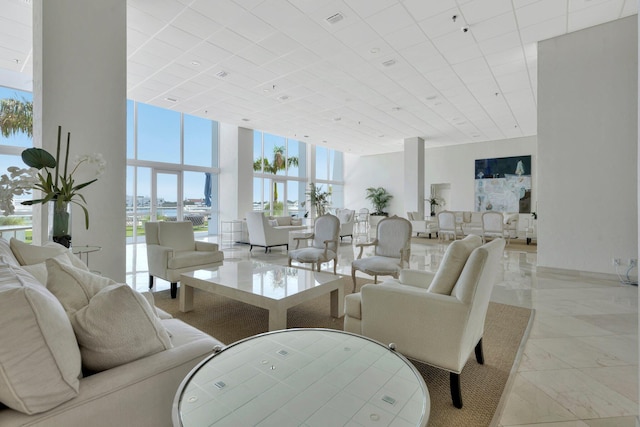 400 N Flagler Dr Unit 506, West Palm Beach, FL 33401 - lobby with a wall of windows and a high ceiling