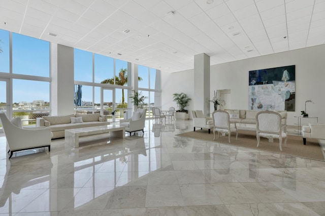 400 N Flagler Dr Unit 506, West Palm Beach, FL 33401 - community lobby featuring a towering ceiling and floor to ceiling windows