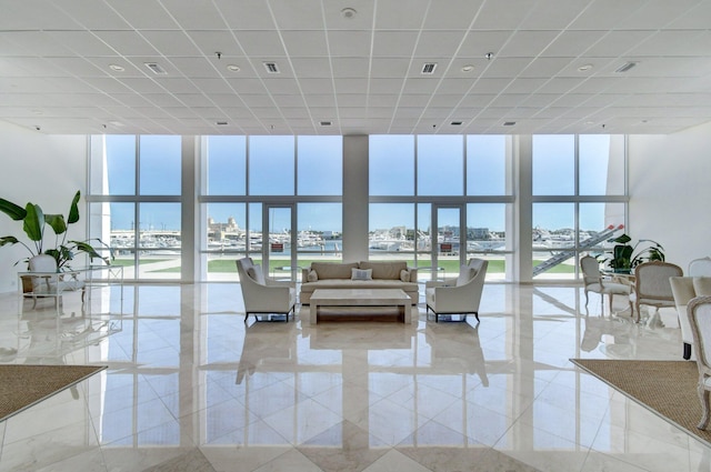 400 N Flagler Dr Unit 506, West Palm Beach, FL 33401 - common area featuring floor to ceiling windows and a drop ceiling