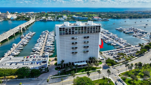 birds eye view of property with a water view