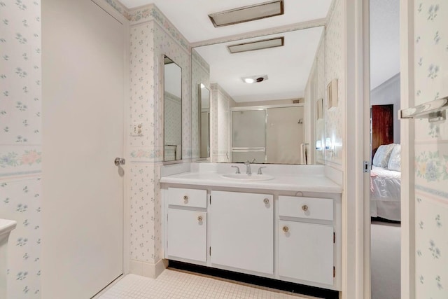 bathroom featuring vanity and walk in shower