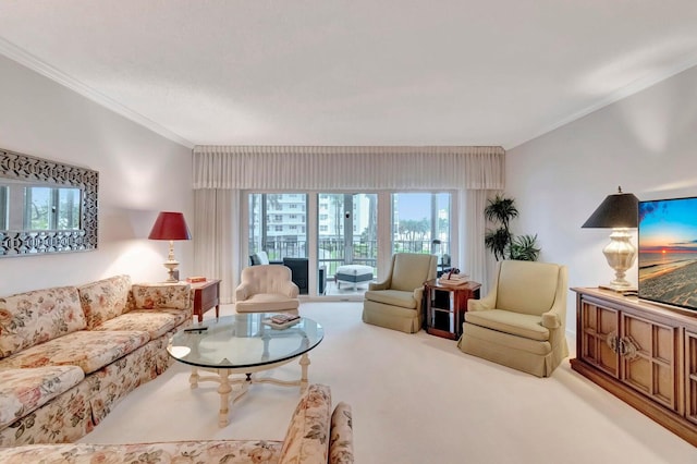 living room featuring crown molding, carpet floors, and a wealth of natural light