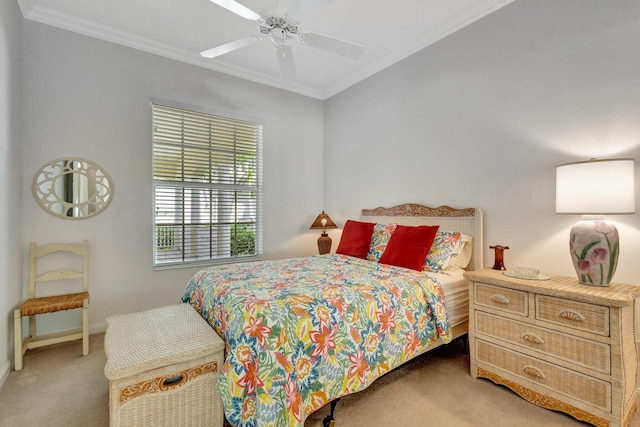 bedroom with crown molding, ceiling fan, and carpet floors