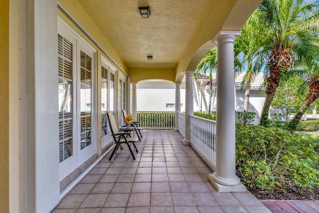 balcony featuring french doors