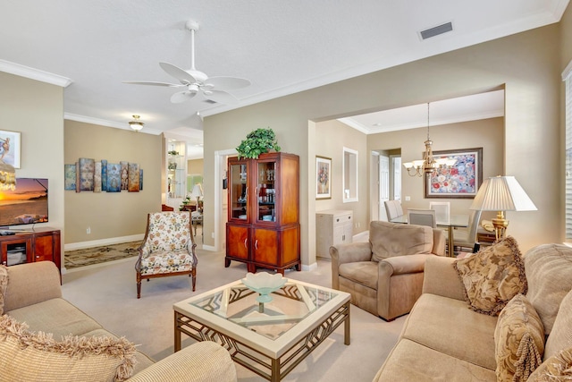 carpeted living room with crown molding and ceiling fan with notable chandelier