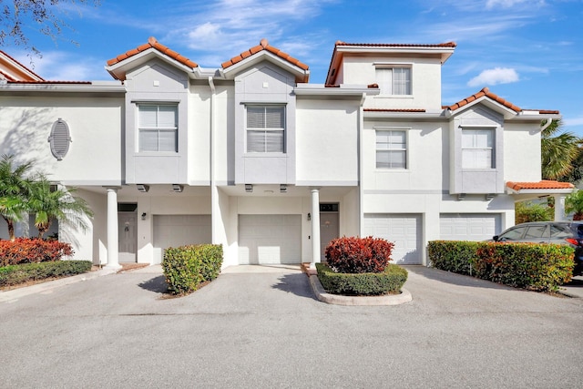 view of front of home with a garage