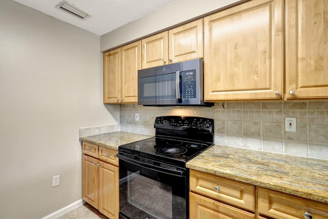 kitchen with light stone counters, tasteful backsplash, light brown cabinets, light tile patterned floors, and electric range