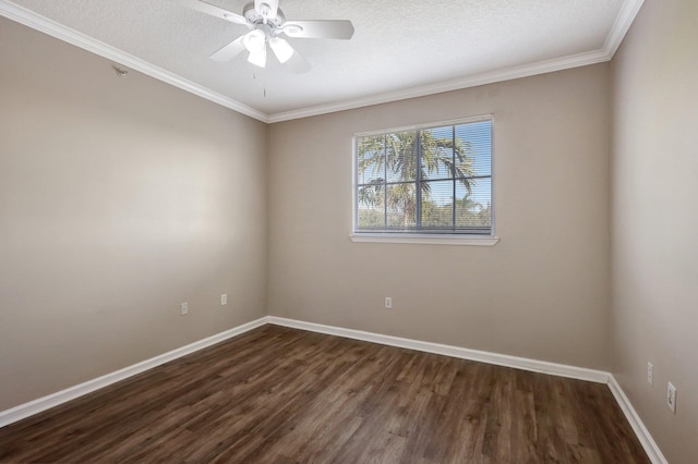 empty room with crown molding, ceiling fan, dark hardwood / wood-style floors, and a textured ceiling