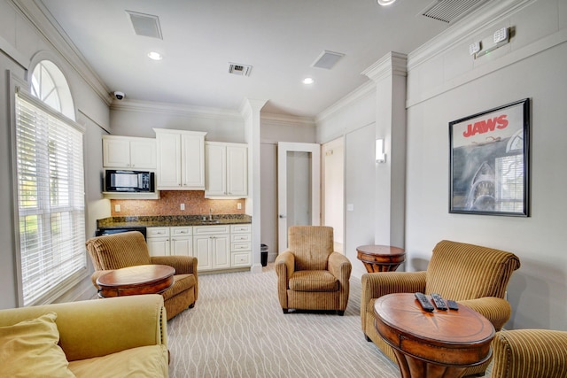 living room with crown molding