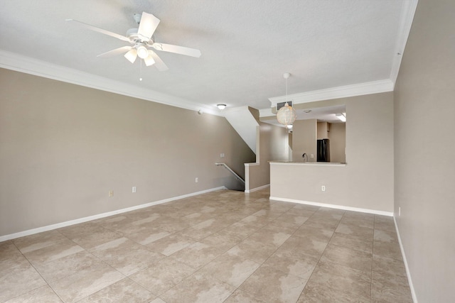 interior space featuring ornamental molding, sink, and ceiling fan