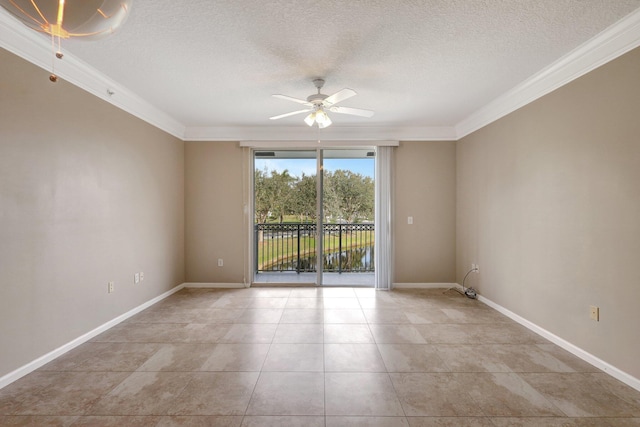 tiled empty room with ceiling fan, ornamental molding, and a textured ceiling