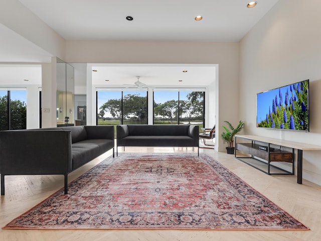 living room featuring ceiling fan