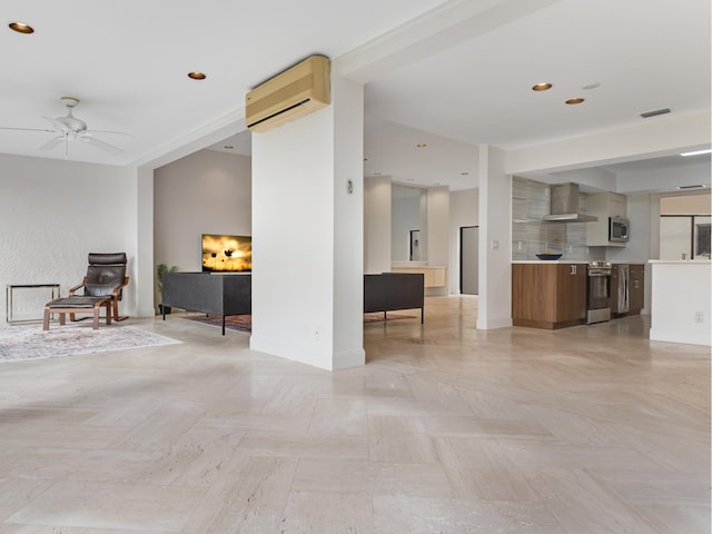 interior space with a wall mounted air conditioner and ceiling fan