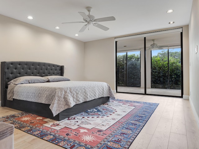 bedroom with ceiling fan, light hardwood / wood-style flooring, and access to outside