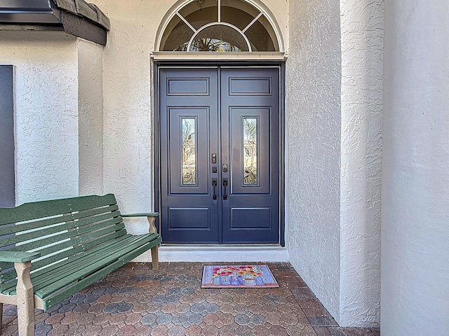 entrance to property with french doors