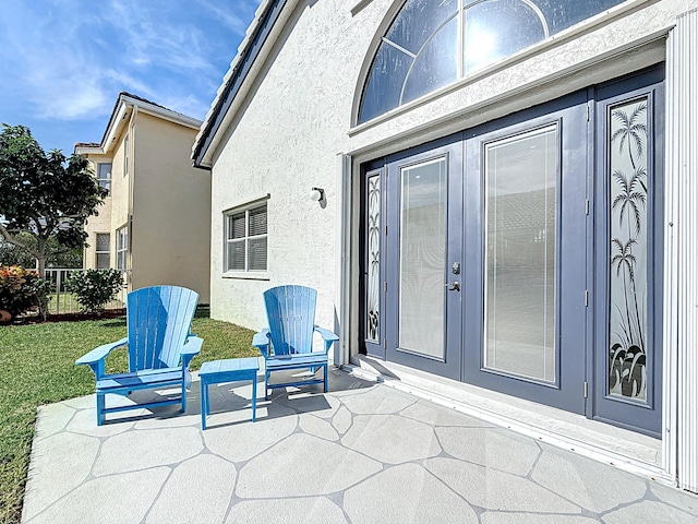 view of patio featuring french doors