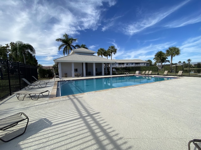 view of pool featuring a patio area