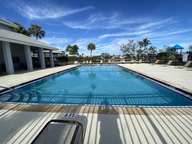 view of swimming pool featuring a patio