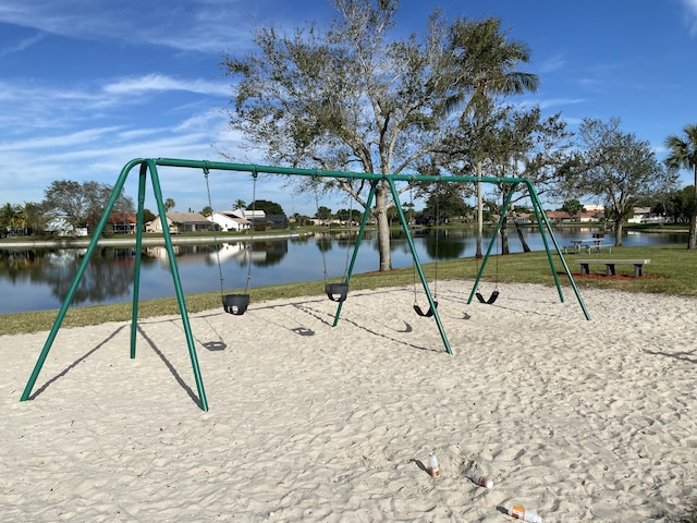 view of playground featuring a water view