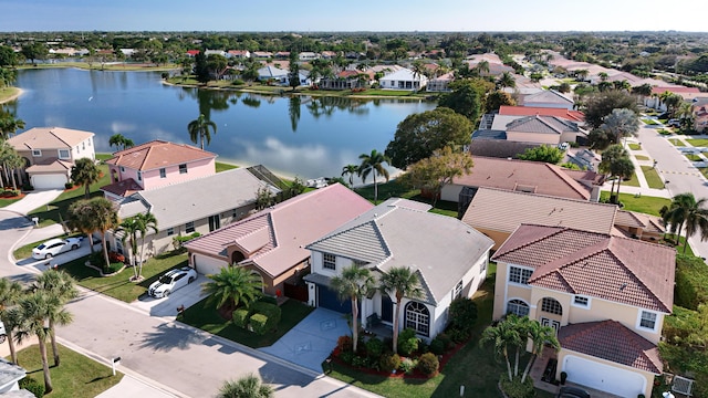 drone / aerial view featuring a water view