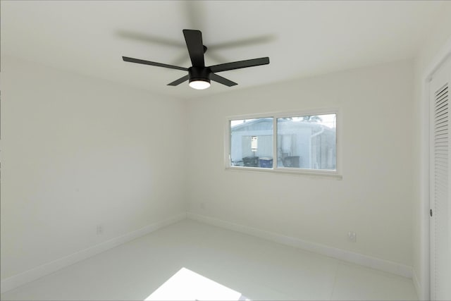 spare room featuring ceiling fan