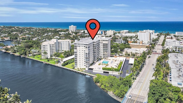 birds eye view of property featuring a water view