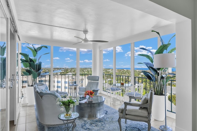 sunroom with ceiling fan and a healthy amount of sunlight