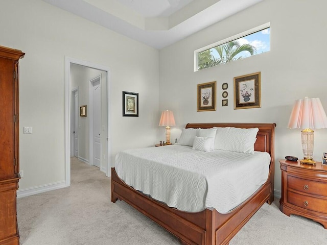 bedroom with light colored carpet