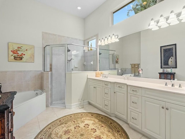 bathroom featuring vanity, separate shower and tub, and tile patterned flooring