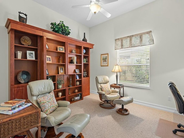 sitting room featuring carpet flooring and ceiling fan