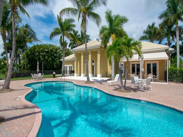 view of pool featuring a patio area