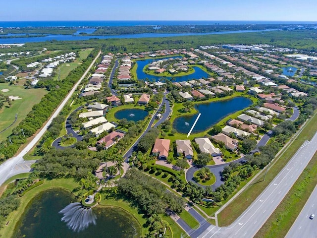 bird's eye view with a water view