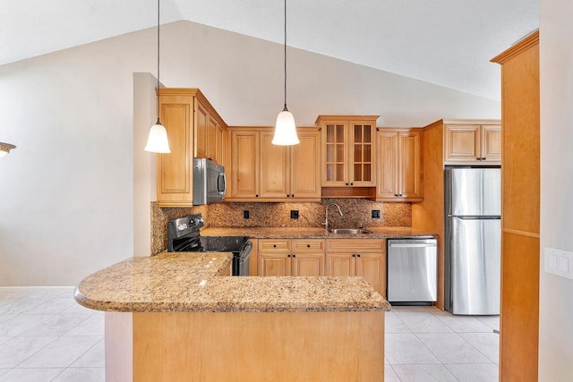 kitchen with stainless steel appliances, decorative light fixtures, decorative backsplash, and kitchen peninsula