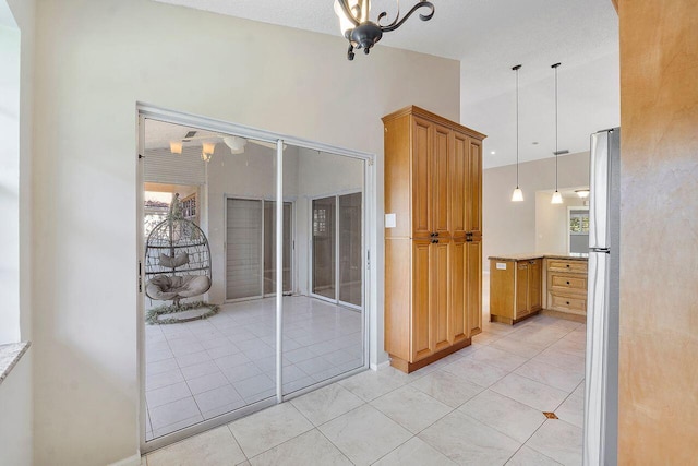 interior space featuring light tile patterned floors